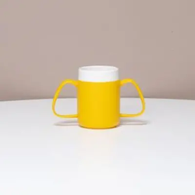 Produktbild für ORNAMIN 2-Henkel-Becher mit Trink-Trick gelb